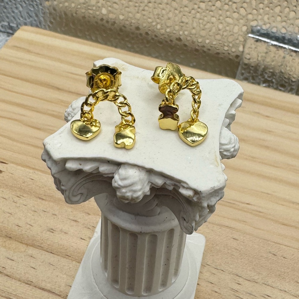 Cool Joy earrings in gold on a chain 925